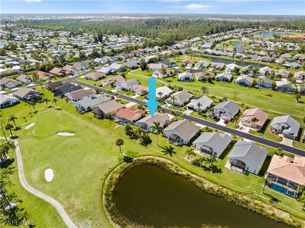 17536 Plumera Lane North Fort Myers, FL 33917 - Photo 43 of 50 an aerial view of a residential houses with outdoor space and a lake view