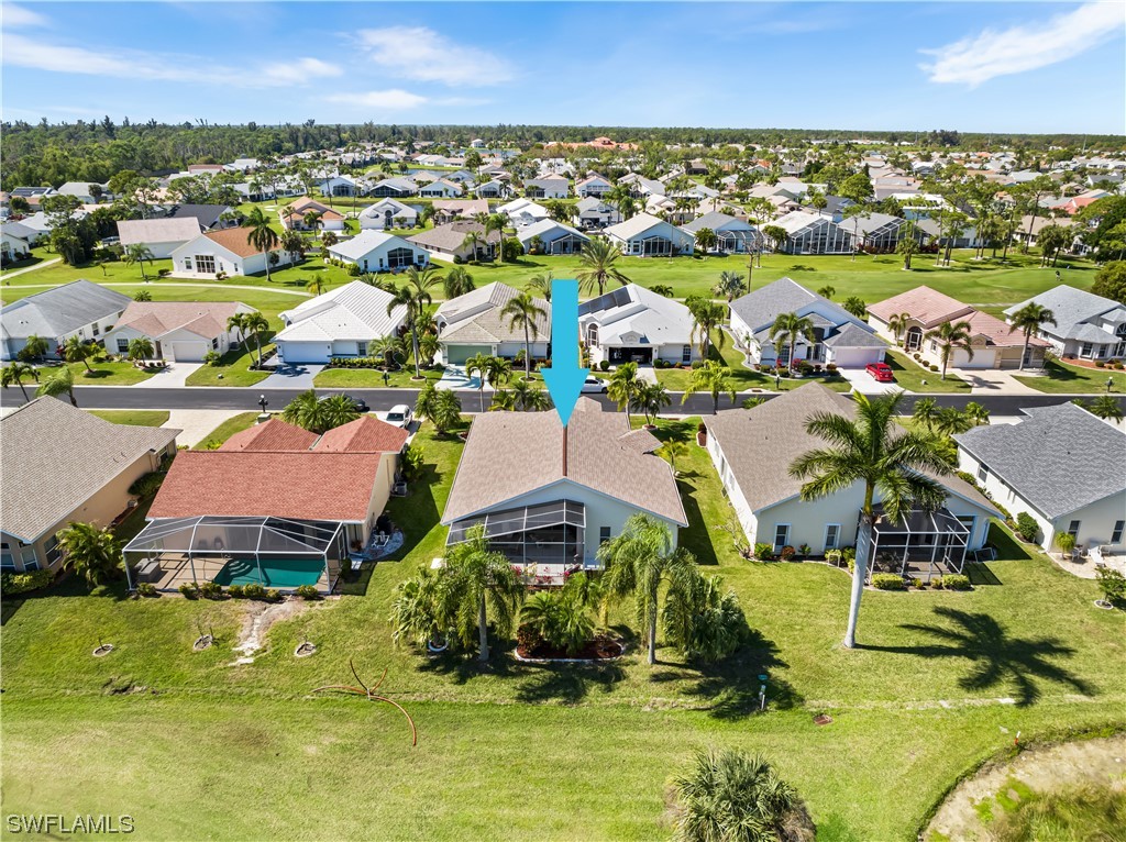 17536 Plumera Lane North Fort Myers, FL 33917 - Photo 44 of 50 an aerial view of residential houses with outdoor space