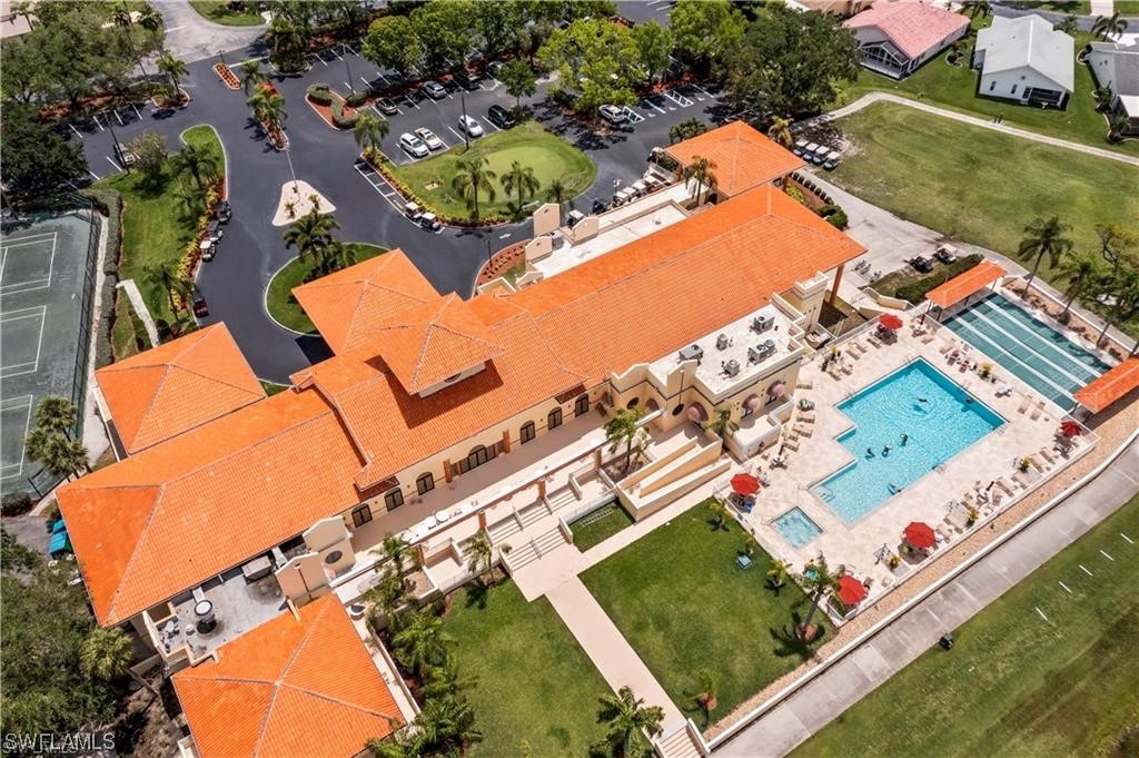 17536 Plumera Lane North Fort Myers, FL 33917 - Photo 50 of 50 an aerial view of a house a yard and a swimming pool