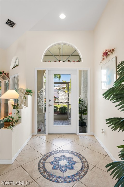 17536 Plumera Lane North Fort Myers, FL 33917 - Photo 5 of 50 a view of a hallway with dining room and wooden floor