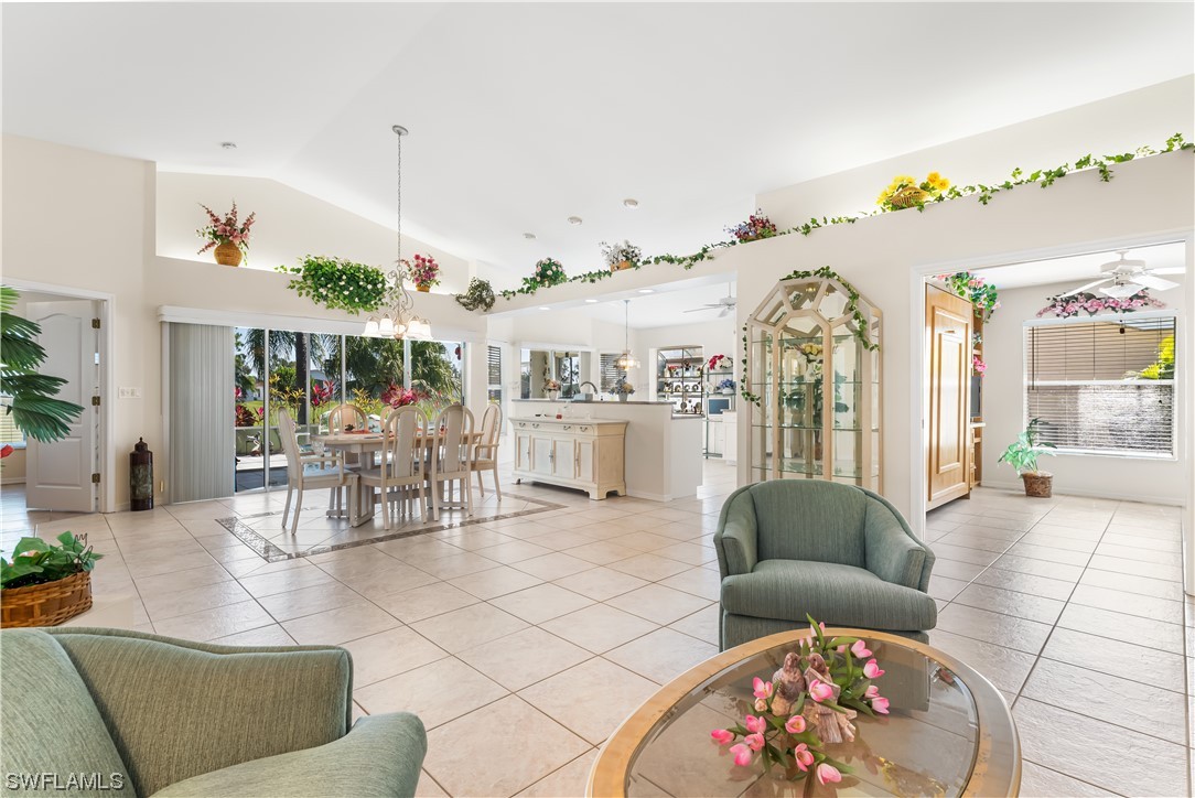 17536 Plumera Lane North Fort Myers, FL 33917 - Photo 7 of 50 a living room with furniture and a chandelier