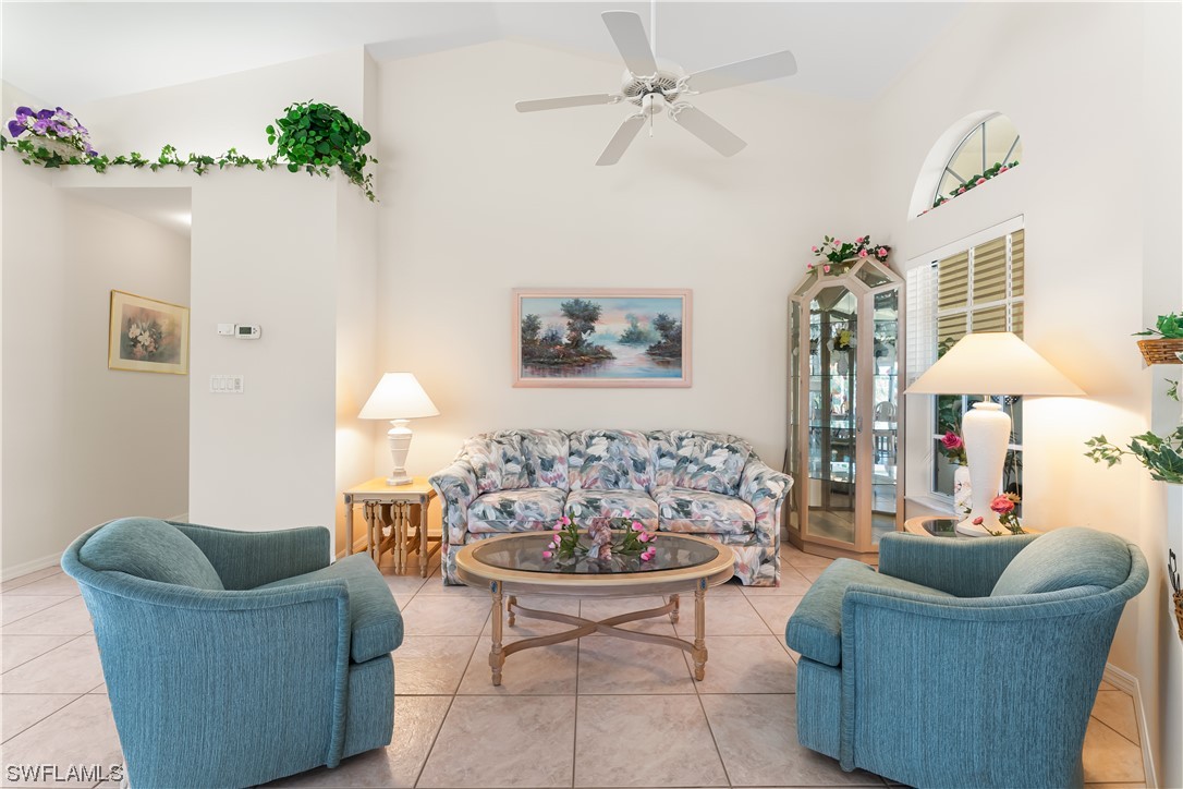 17536 Plumera Lane North Fort Myers, FL 33917 - Photo 8 of 50 a living room with furniture and a chandelier