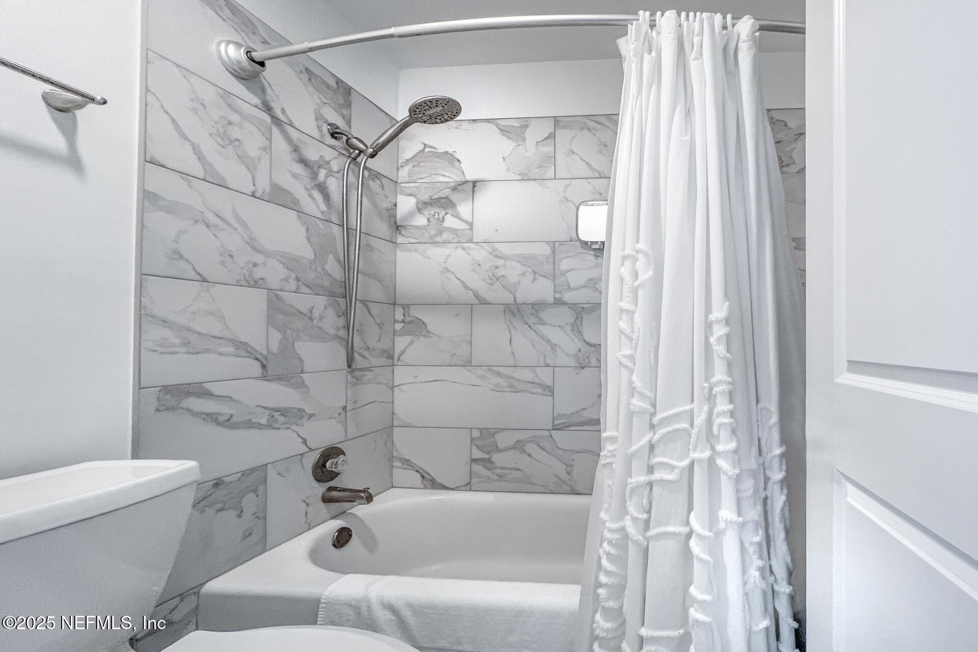 3426 Sea Marsh Road Fernandina Beach, FL 32034 - Photo 22 of 39 a bathroom with a shower and a toilet
