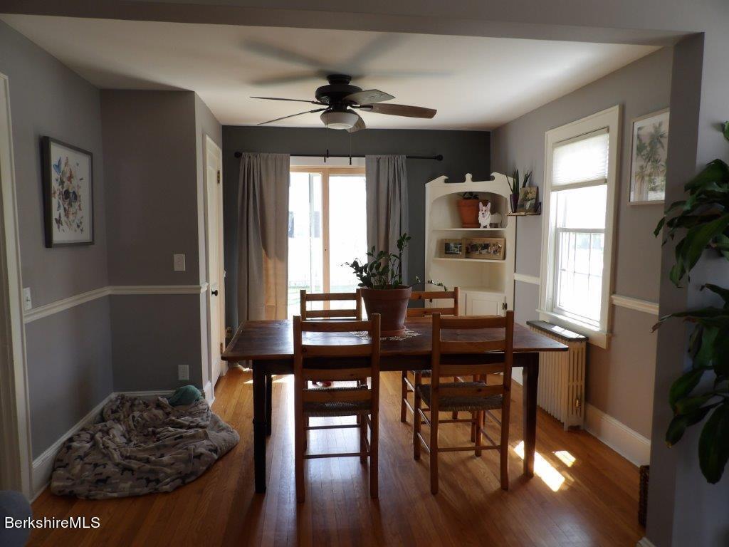 64 Cleveland Street Pittsfield, MA 01201 - Photo 15 of 32 a view of a dining room with furniture window and wooden floor
