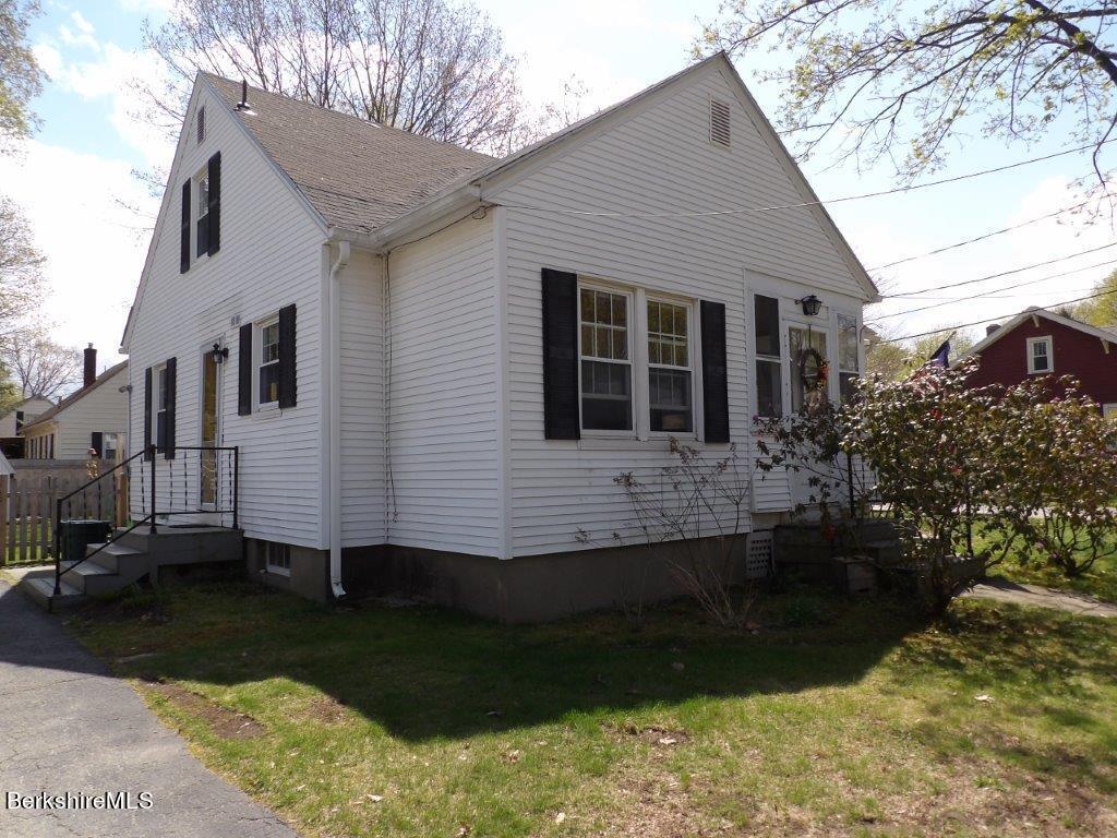 64 Cleveland Street Pittsfield, MA 01201 - Photo 2 of 32 a view of a house with a yard