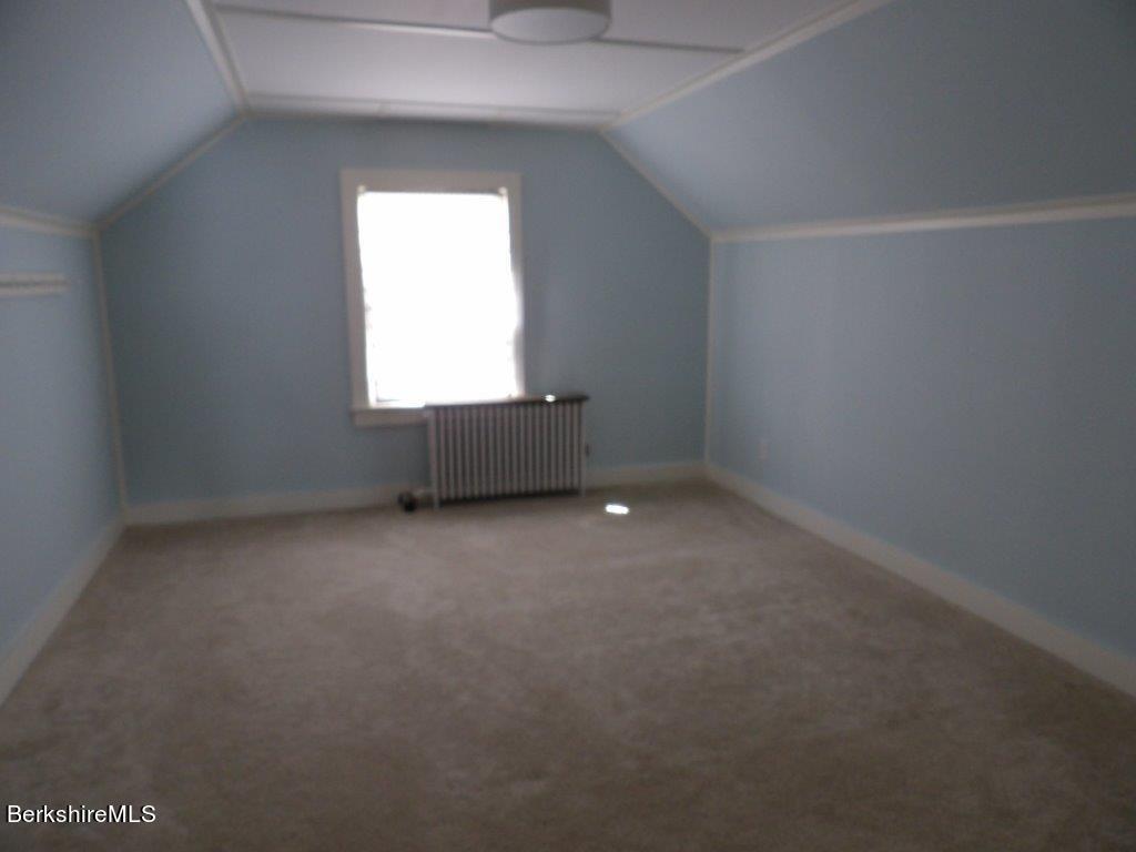64 Cleveland Street Pittsfield, MA 01201 - Photo 21 of 32 an empty room with a window