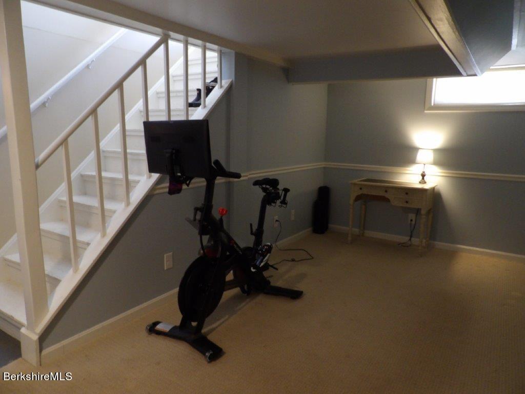 64 Cleveland Street Pittsfield, MA 01201 - Photo 24 of 32 a view of a room with gym equipment