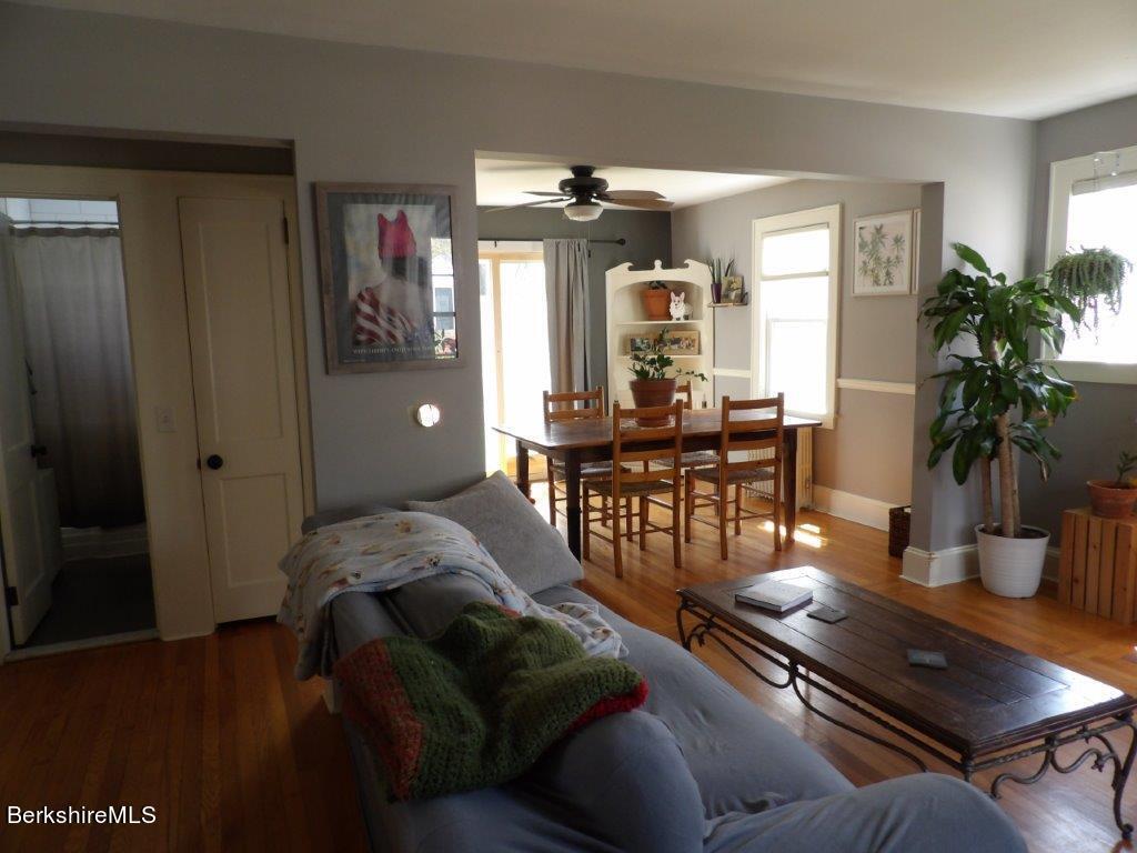 64 Cleveland Street Pittsfield, MA 01201 - Photo 10 of 32 a living room with furniture and wooden floor