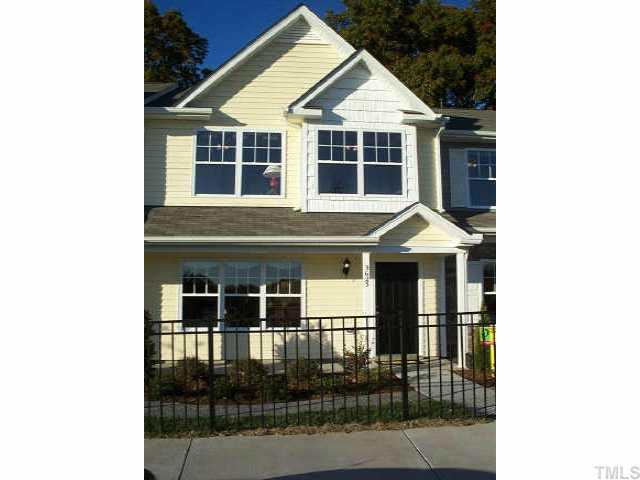 3637 Bison Hill Lane Raleigh, NC 27604 - Photo 1 of 10 a front view of a house with a yard