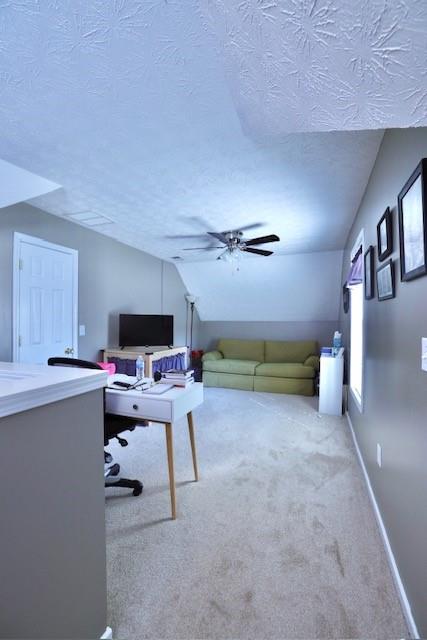 50 Butler Bridge Circle Covington, GA 30016 - Photo 11 of 12 a living room with furniture and a flat screen tv