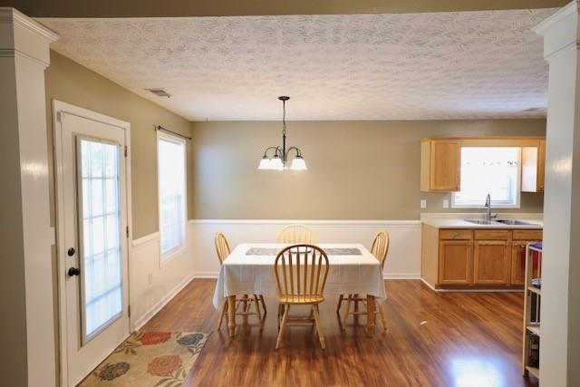 50 Butler Bridge Circle Covington, GA 30016 - Photo 5 of 12 a view of a dining room with furniture window and wooden floor