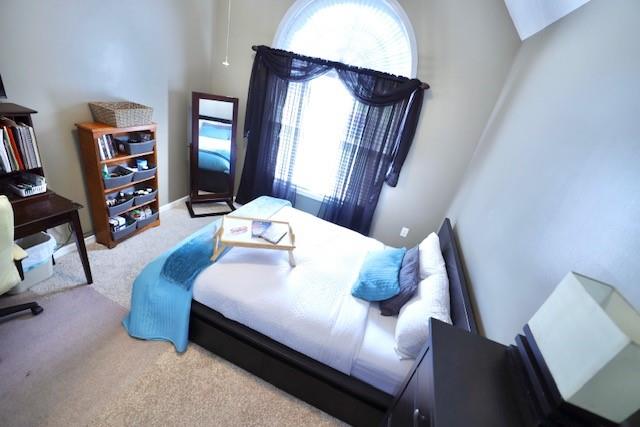 50 Butler Bridge Circle Covington, GA 30016 - Photo 6 of 12 a living room with furniture and a large window