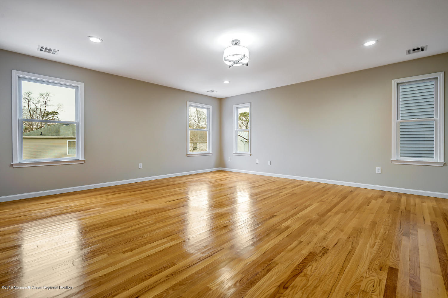 14 Stuyvesant Road Brick, NJ 08723 - Photo 19 of 32 a view of empty room with wooden floor and fan