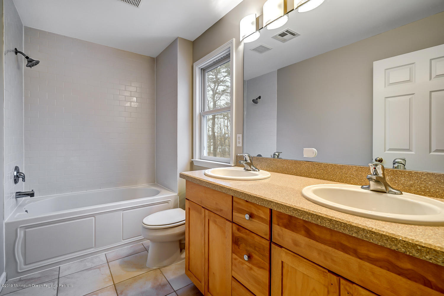 14 Stuyvesant Road Brick, NJ 08723 - Photo 21 of 32 a bathroom with a granite countertop sink a toilet and bathtub