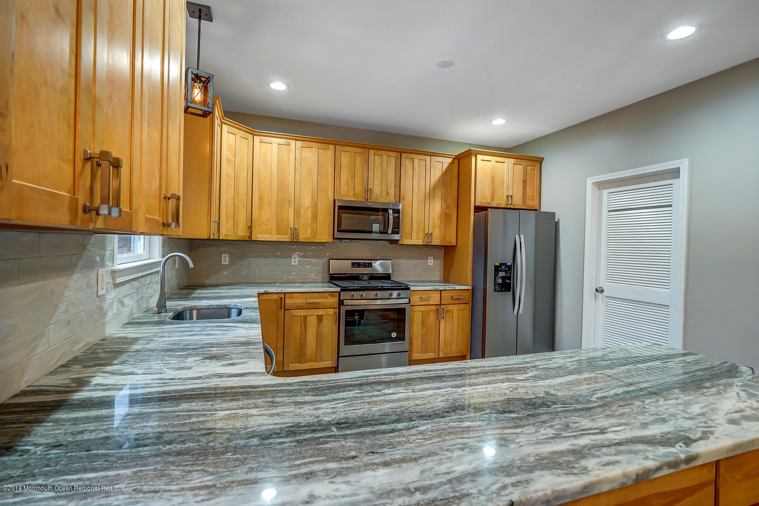14 Stuyvesant Road Brick, NJ 08723 - Photo 3 of 32 a kitchen with stainless steel appliances granite countertop a refrigerator stove and oven