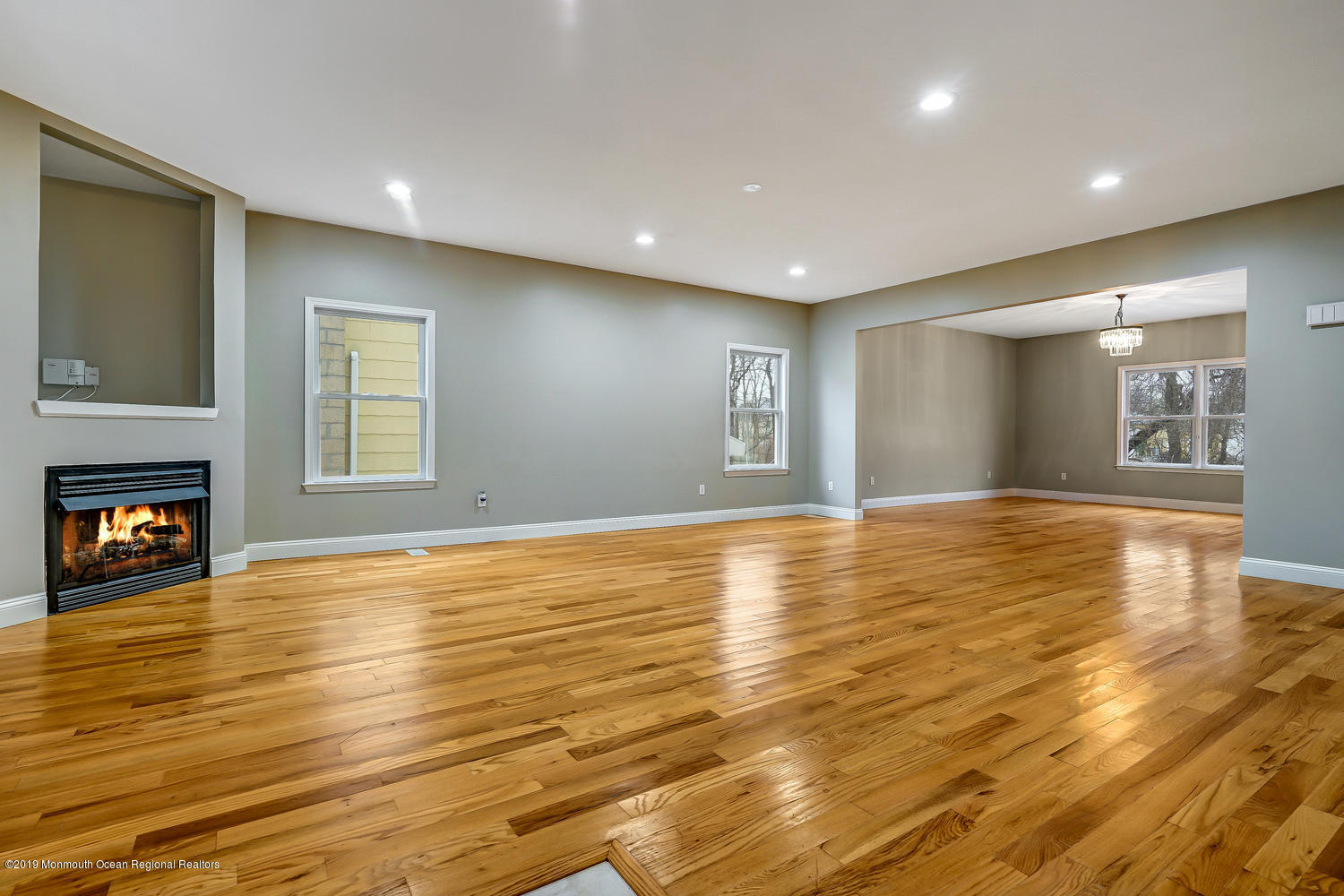 14 Stuyvesant Road Brick, NJ 08723 - Photo 8 of 32 a view of an empty room with window and wooden floor