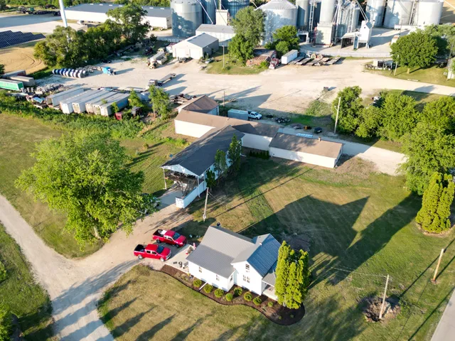 an aerial view of residential houses with outdoor space