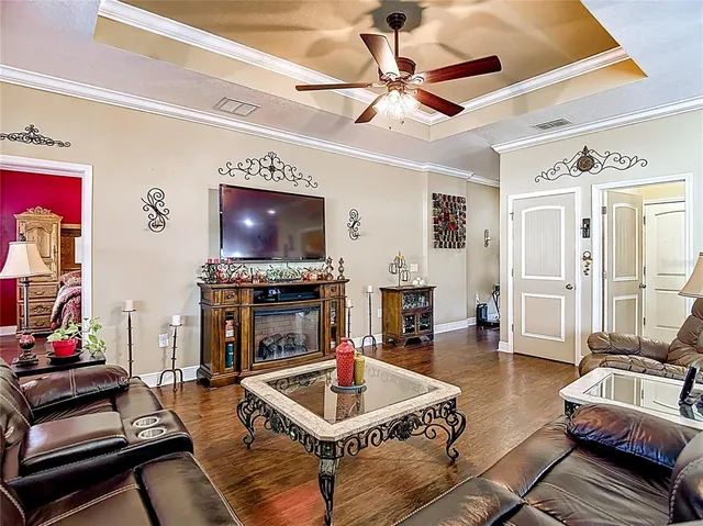 a kitchen with stainless steel appliances granite countertop a sink stove and microwave