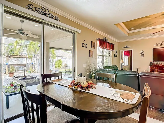 a kitchen with granite countertop a refrigerator and a sink