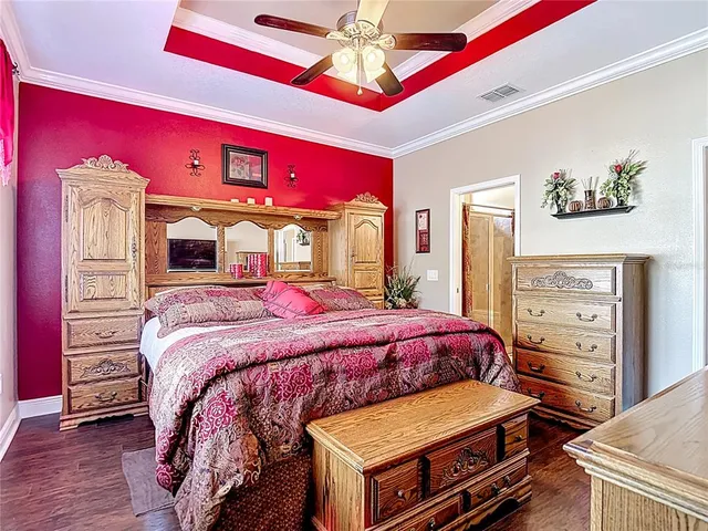 a view of a backyard with plants and a patio