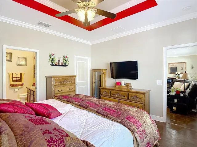 a view of a house with backyard porch and sitting area
