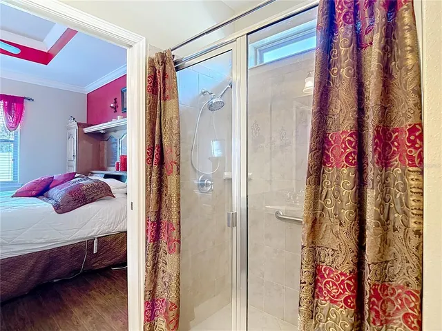 an aerial view of a house with yard swimming pool and outdoor seating