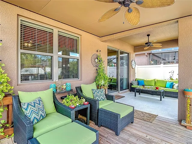 an aerial view of a house with garden space and street view