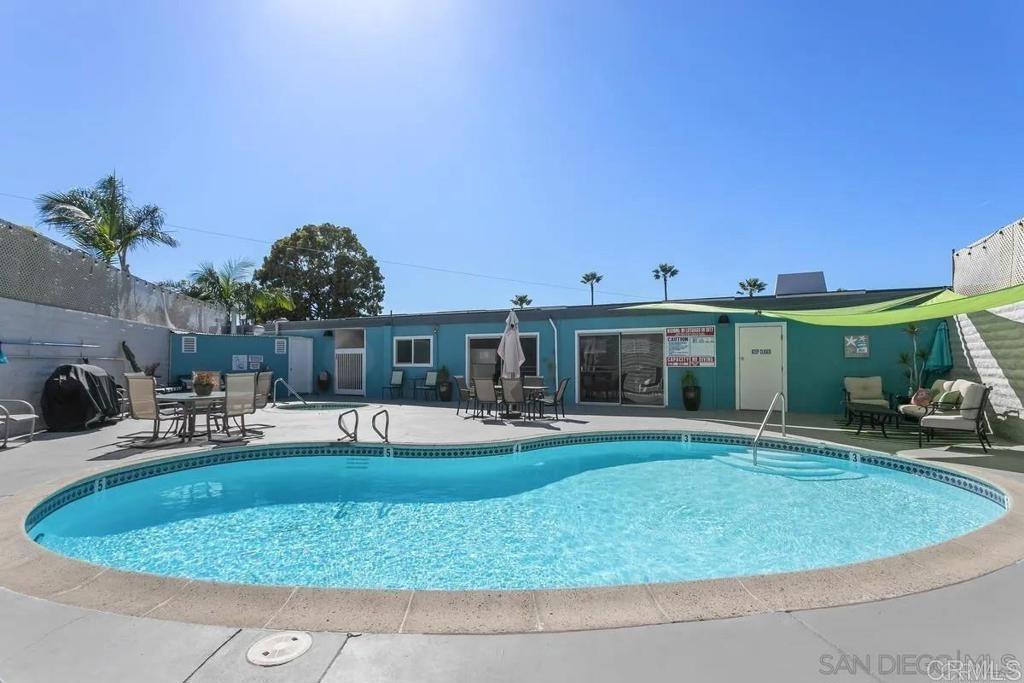 3606 Vista Rey, Unit 37 Oceanside, CA 92057 - Photo 34 of 45 a view of a house with swimming pool and sitting area