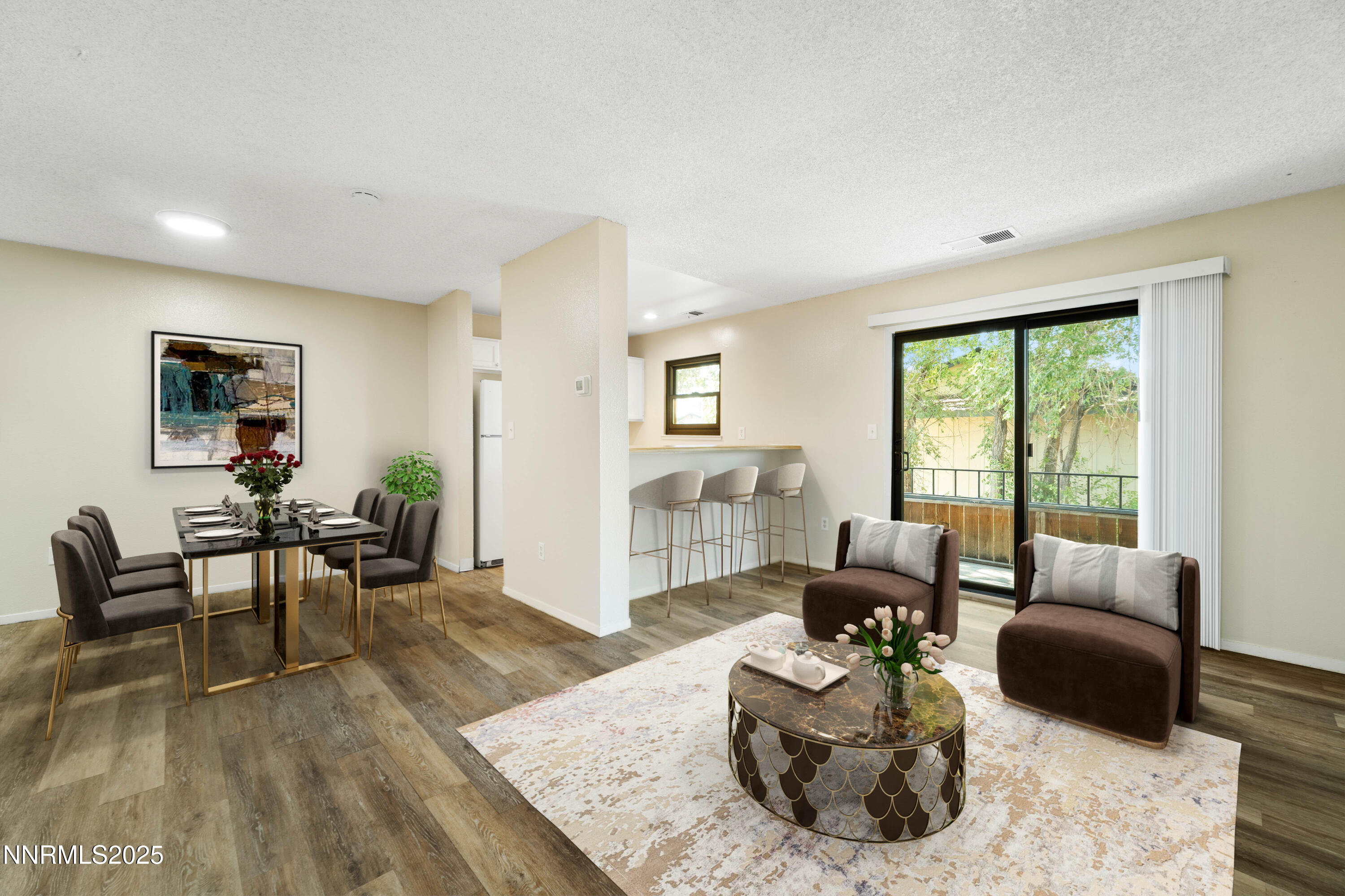 2229 Kietzke Lane, Unit G Reno, NV 89502 - Photo 2 of 9 a living room with furniture window and wooden floor