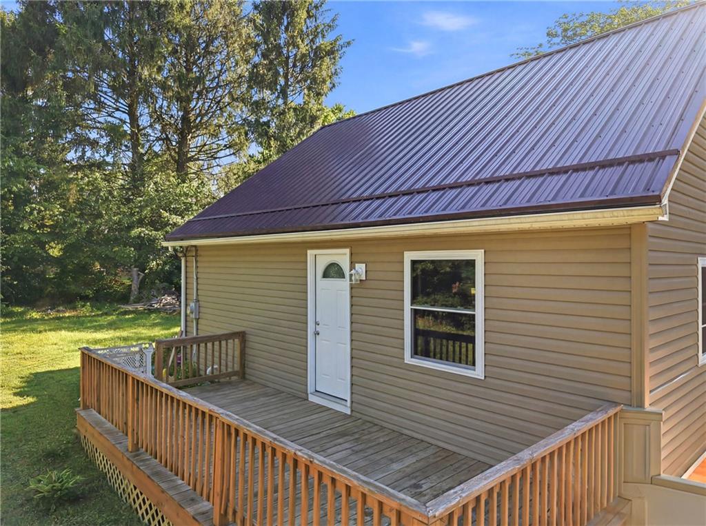 7 Old Fredonia Road Mercer, PA 16137 - Photo 18 of 38 Rear deck and metal roof.