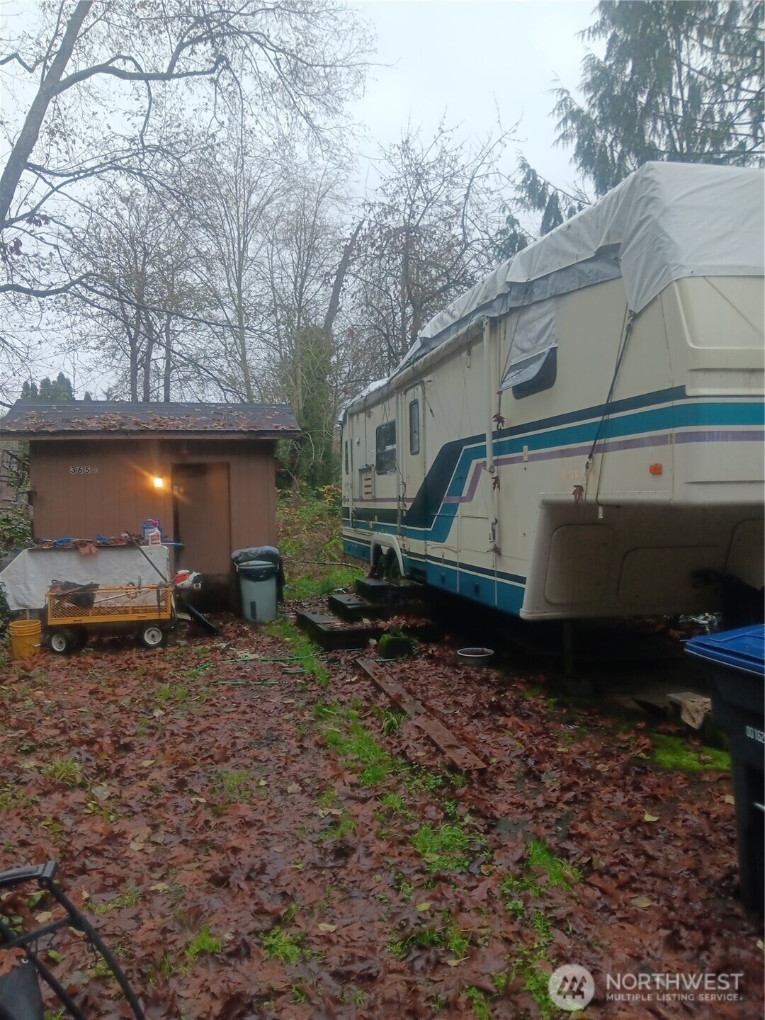 365 Southeast Arcadia Road Shelton, WA 98584 - Photo 1 of 6 a backyard of a house with barbeque oven