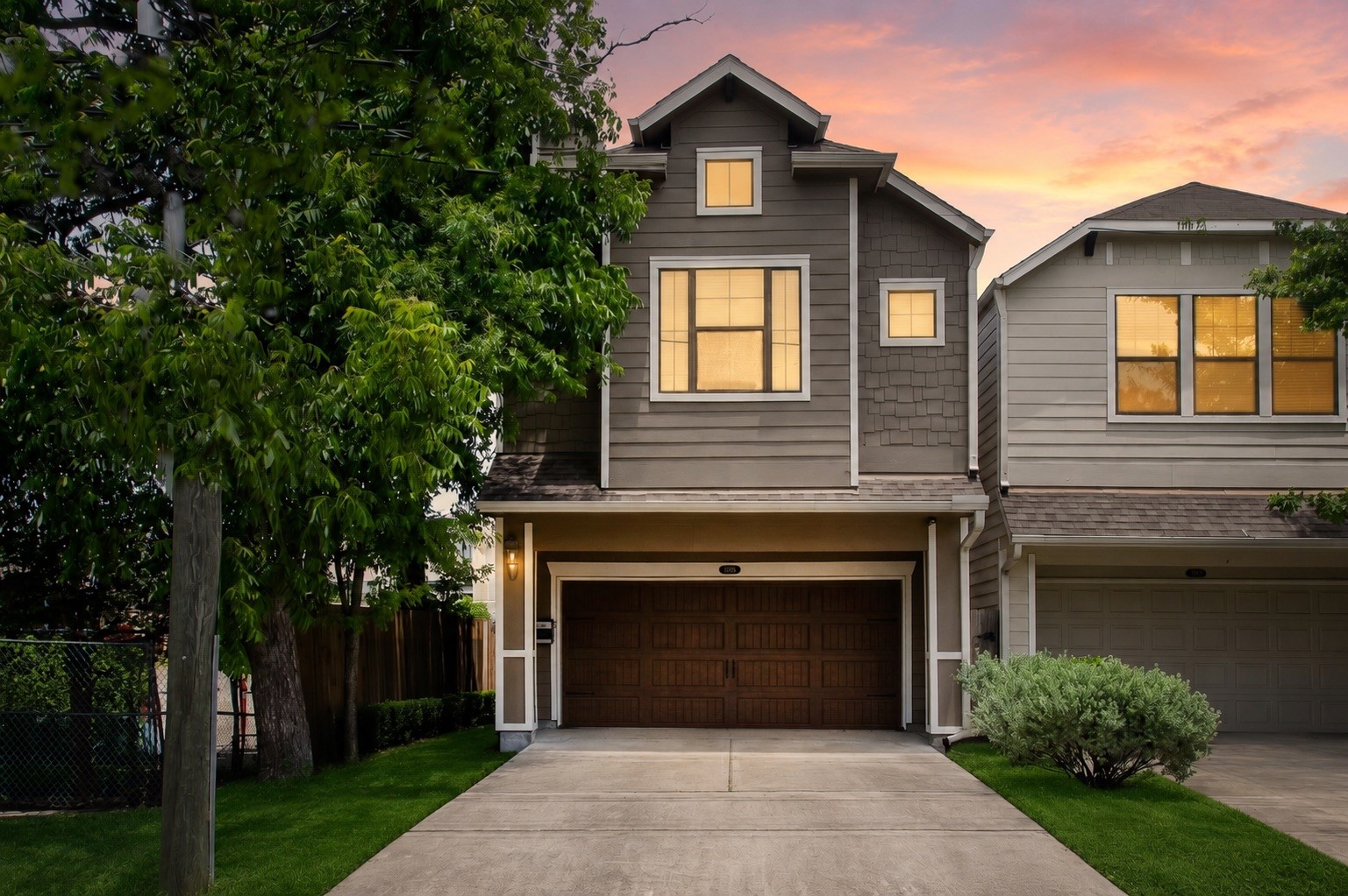 Charming freestanding home featuring attractive curb appeal, a private full driveway, and a welcoming exterior in the highly sought-after Cottage Grove neighborhood.