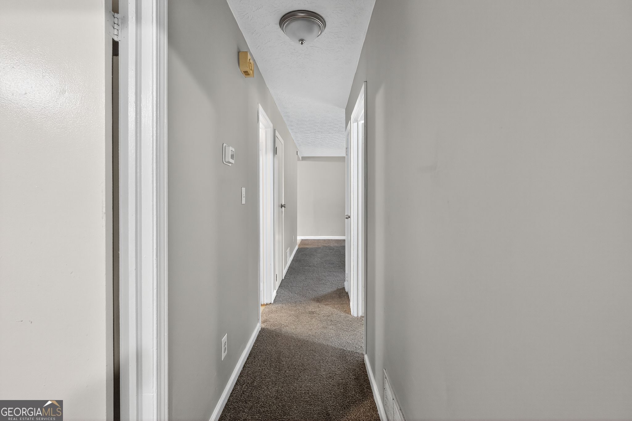 8207 Dunellen Lane Jonesboro, GA 30238 - Photo 11 of 33 a view of a hallway view with staircase
