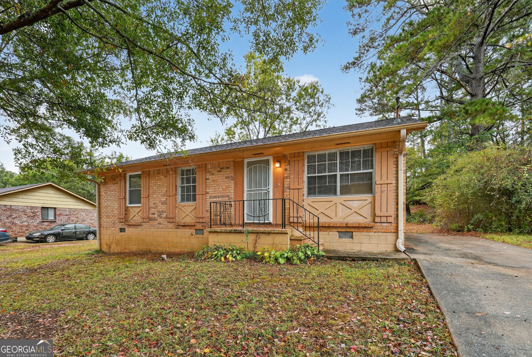 8207 Dunellen Lane Jonesboro, GA 30238 - Photo 2 of 33 front view of a house with a yard