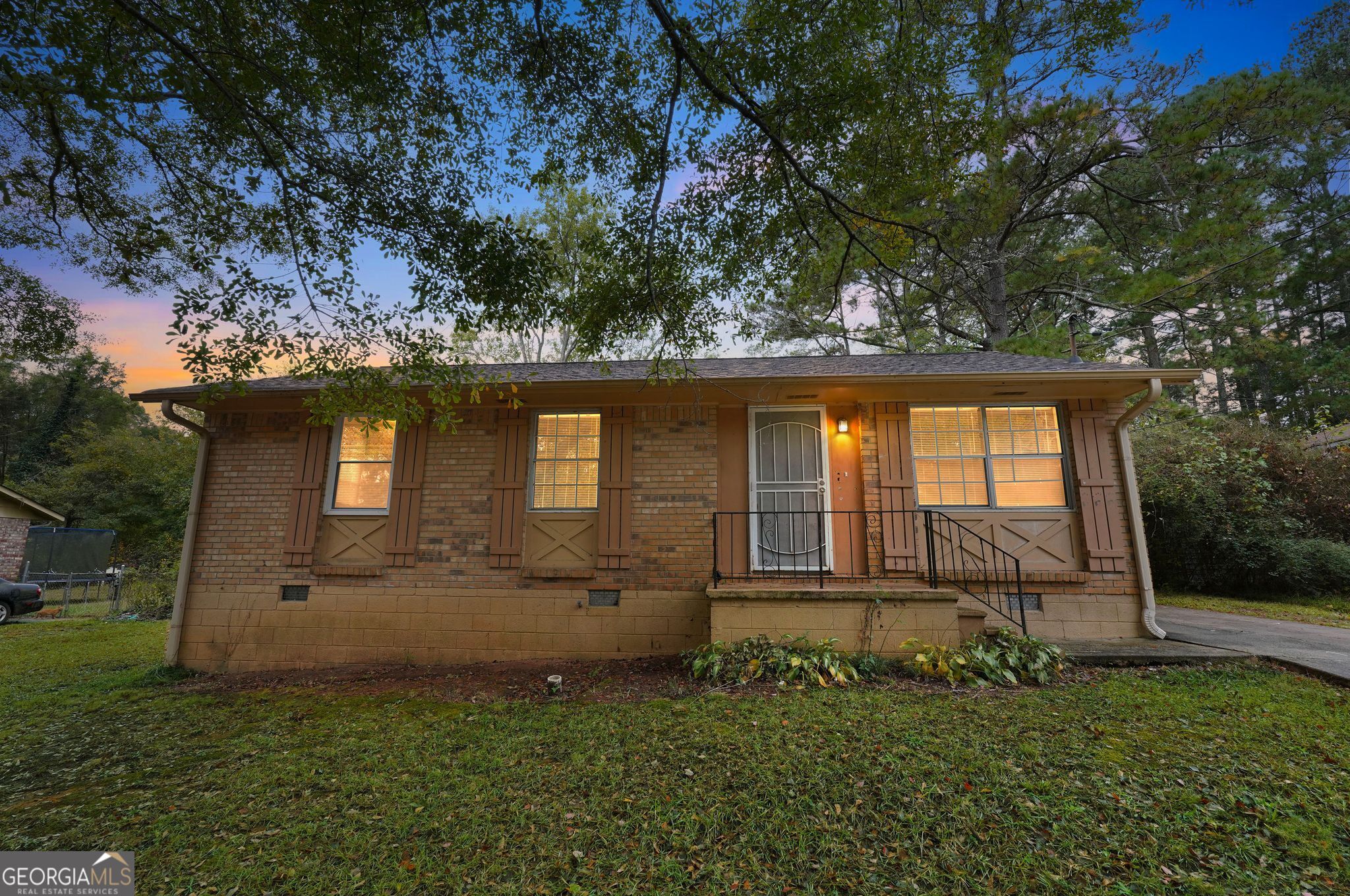 8207 Dunellen Lane Jonesboro, GA 30238 - Photo 32 of 33 front view of a house with a yard