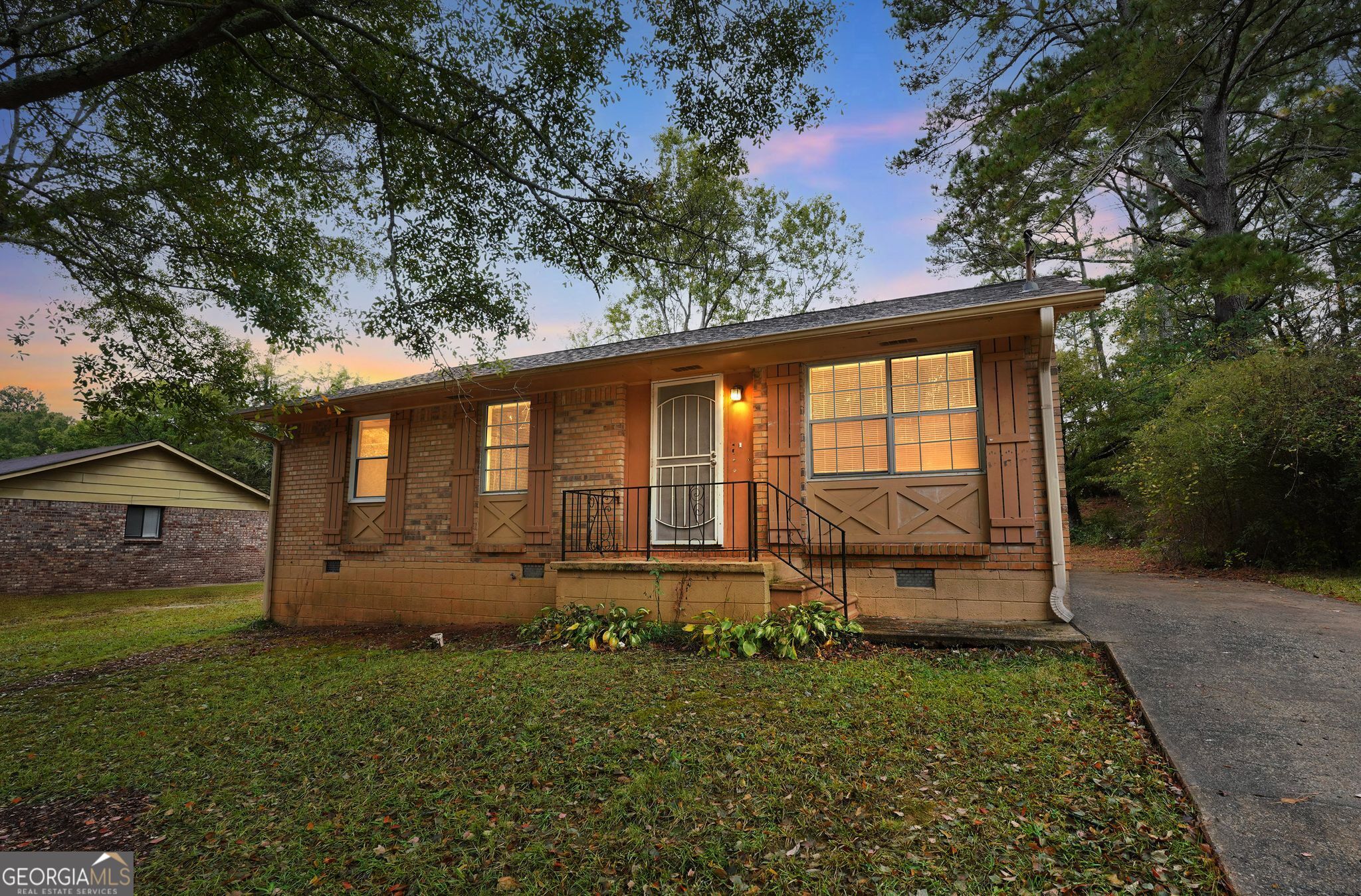 8207 Dunellen Lane Jonesboro, GA 30238 - Photo 33 of 33 front view of a house with a yard