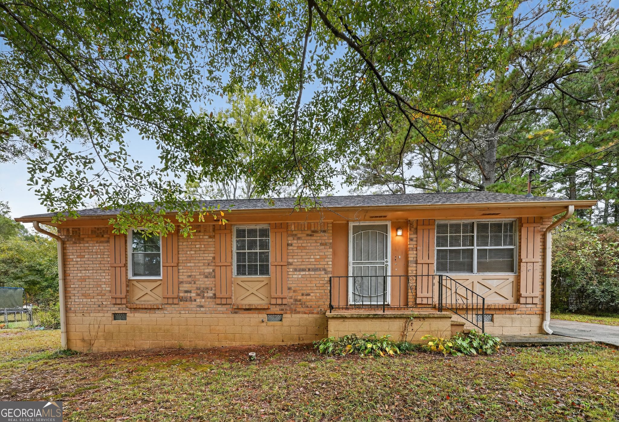 8207 Dunellen Lane Jonesboro, GA 30238 - Photo 4 of 33 front view of a house with a yard