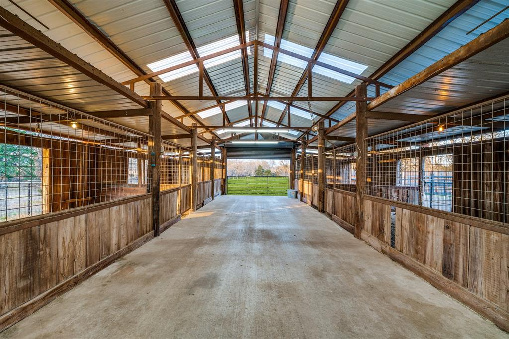 1353 Spring Creek Road Collinsville, TX 76233 - Photo 33 of 40 Spacious Barn with 5 Separated Stables