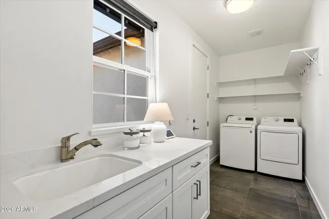 a bathroom with a sink and a vanity