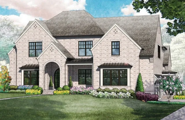 a front view of a house with a garden and plants