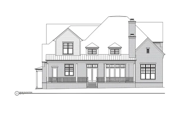 a black and white photo of a living room