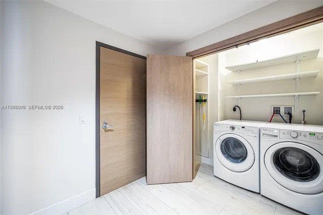 a utility room with dryer and washer