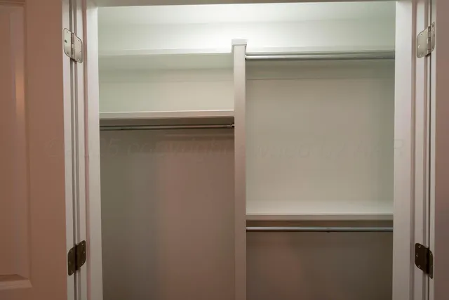 a bathroom with a sink and a large mirror