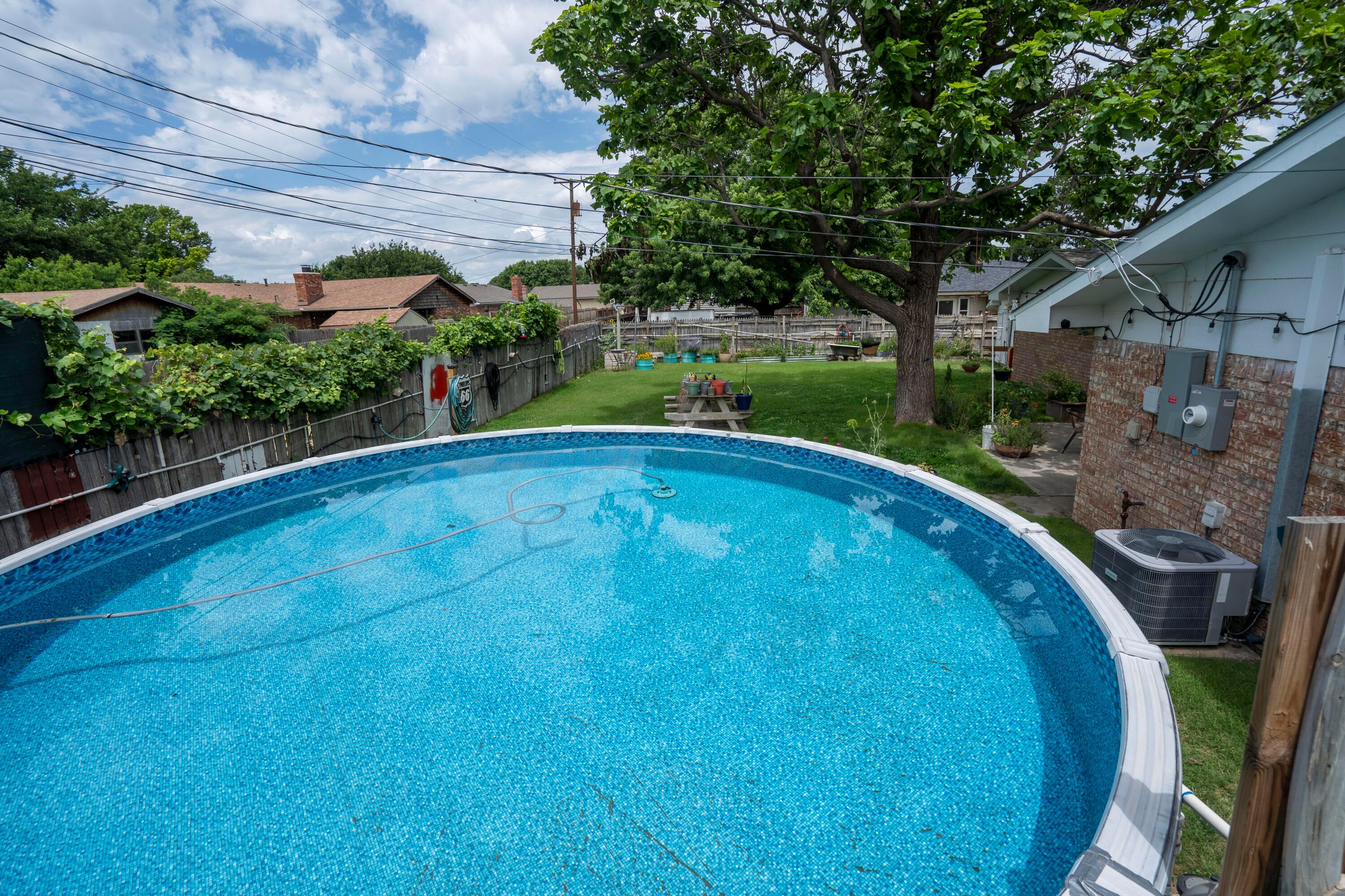 314 Overland Trail Fritch, TX 79036 - Photo 36 of 36 a view of a backyard with swimming pool