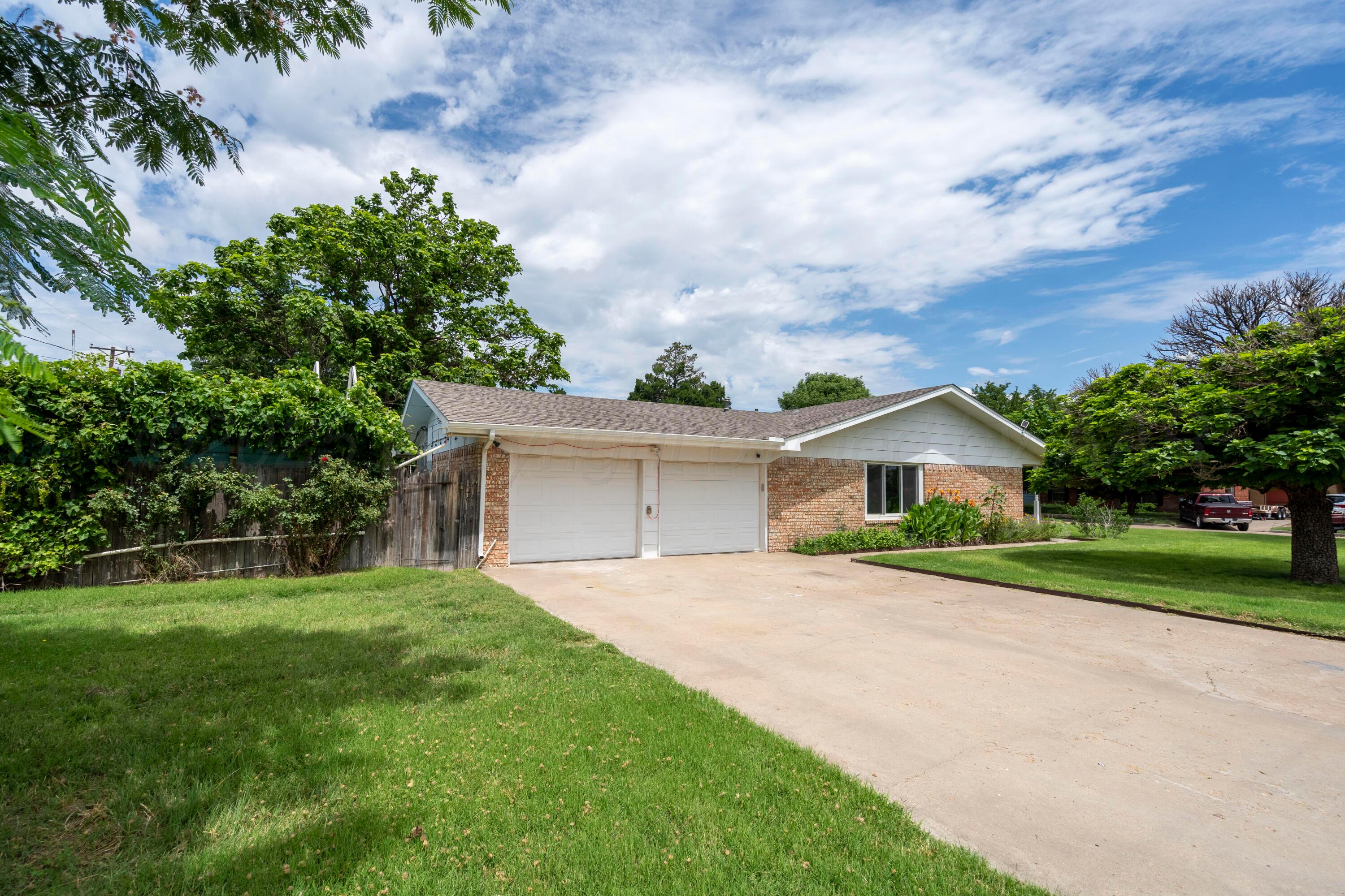 314 Overland Trail Fritch, TX 79036 - Photo 5 of 36 a front view of a house with yard