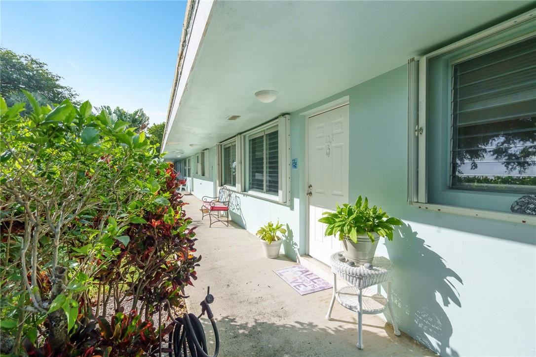 3801 Northeast 22nd Terrace, Unit 12A Lighthouse Point, FL 33064 - Photo 26 of 34 a view of a bunch of flowers in a balcony