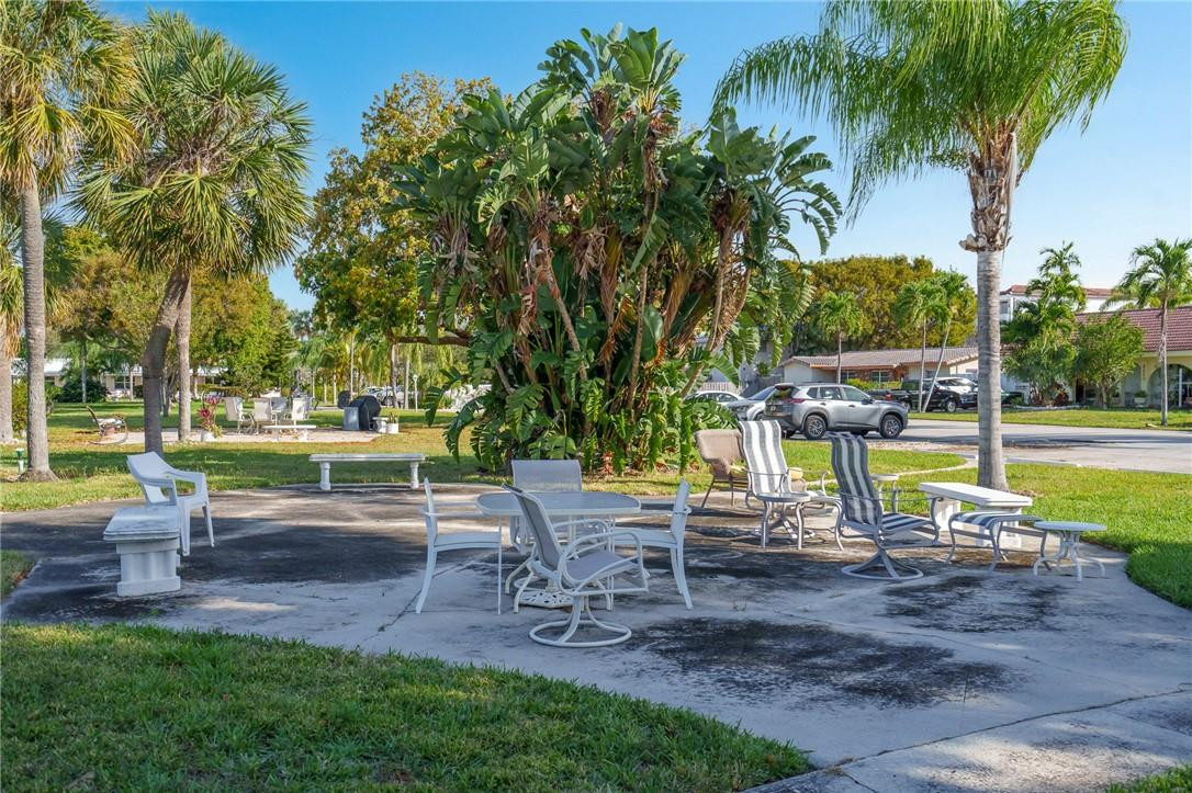 3801 Northeast 22nd Terrace, Unit 12A Lighthouse Point, FL 33064 - Photo 27 of 34 a view of a park with slide