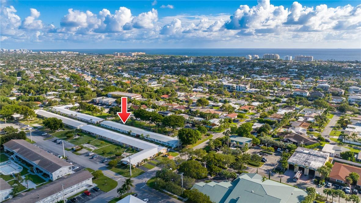 3801 Northeast 22nd Terrace, Unit 12A Lighthouse Point, FL 33064 - Photo 32 of 34 an aerial view of a city