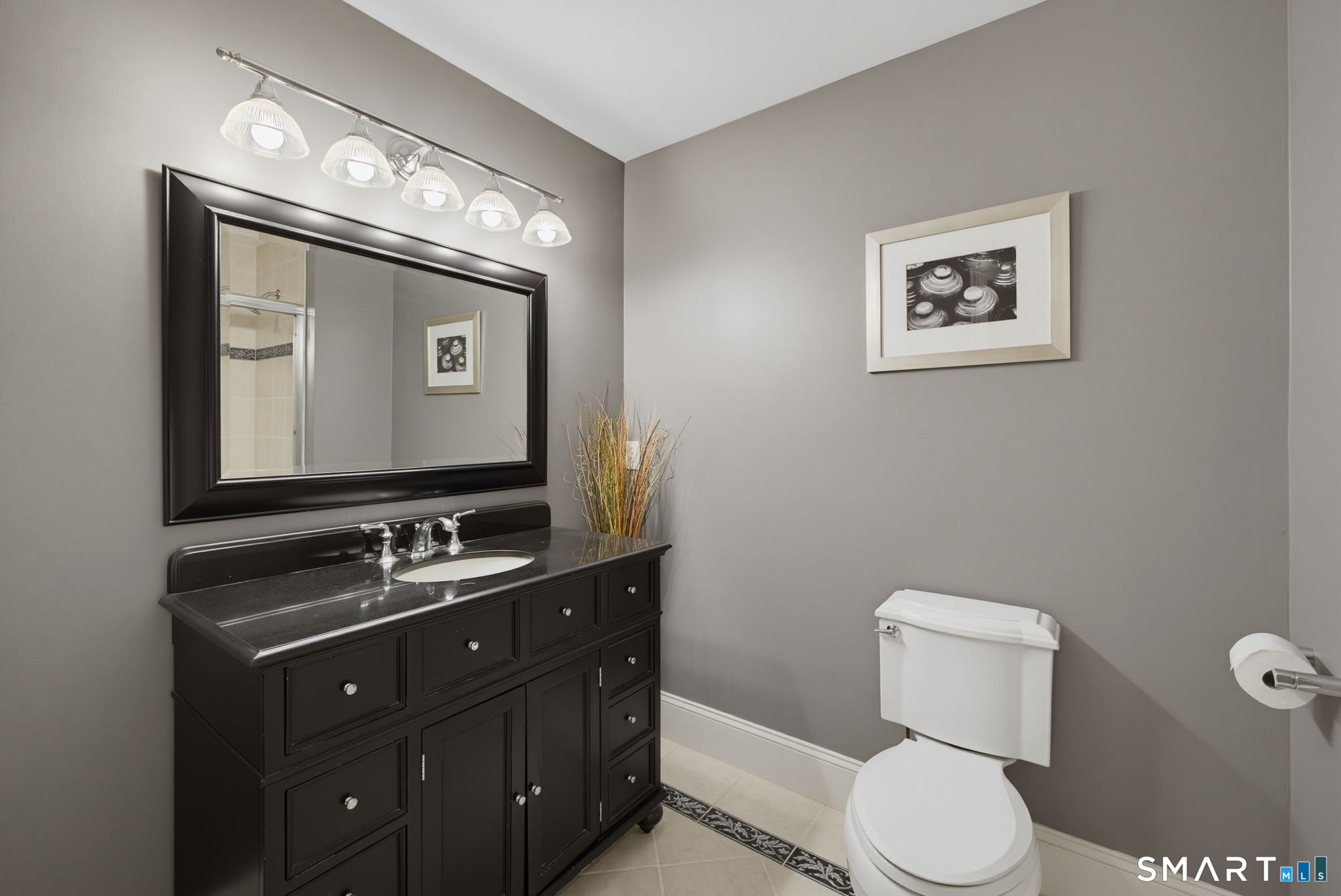 158 Appian Way Coventry, CT 06238 - Photo 35 of 40 a bathroom with a toilet sink and mirror