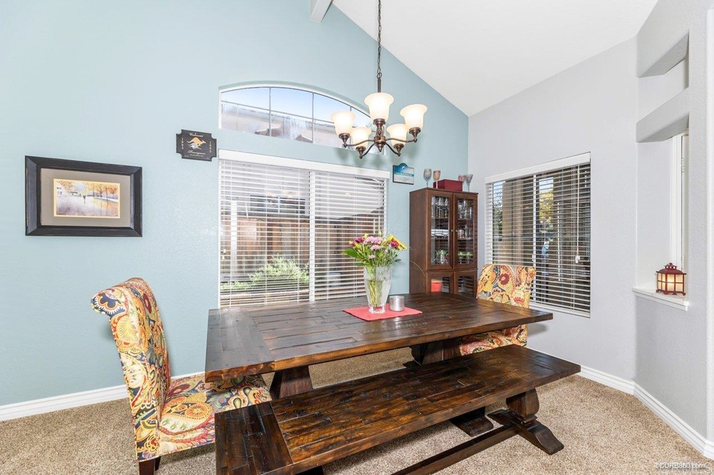 1840 Century Way Escondido, CA 92026 - Photo 17 of 36 a living room with furniture flat screen tv and a large window